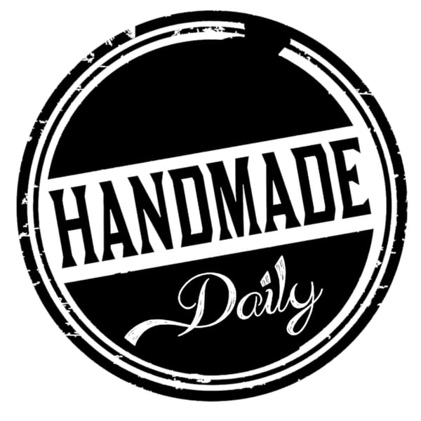 Black and white circular stamp with "HANDMADE Daily" text, indicating fresh Mediterranean food.
